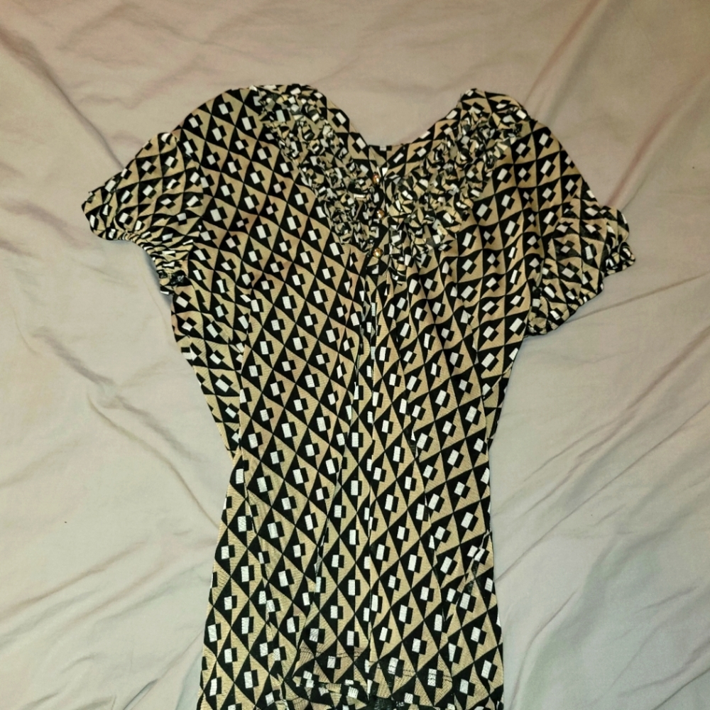 Tan and black colored blouse